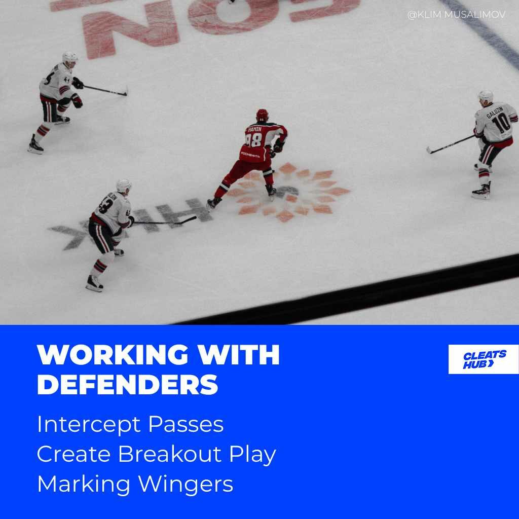 Center working with defenders